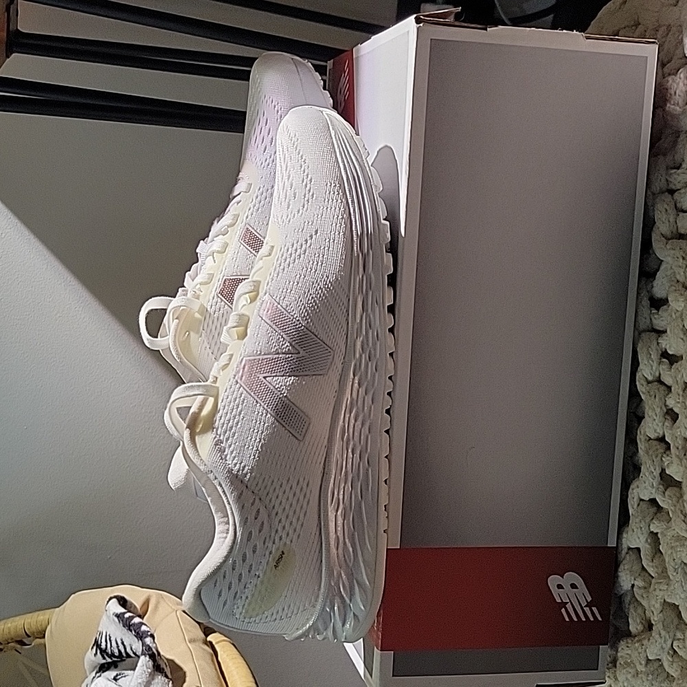 Womens New Balance white running shoes